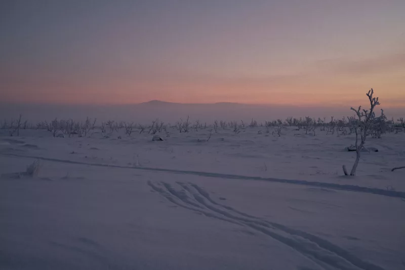 A snowy landscape in Finnish wilderness.