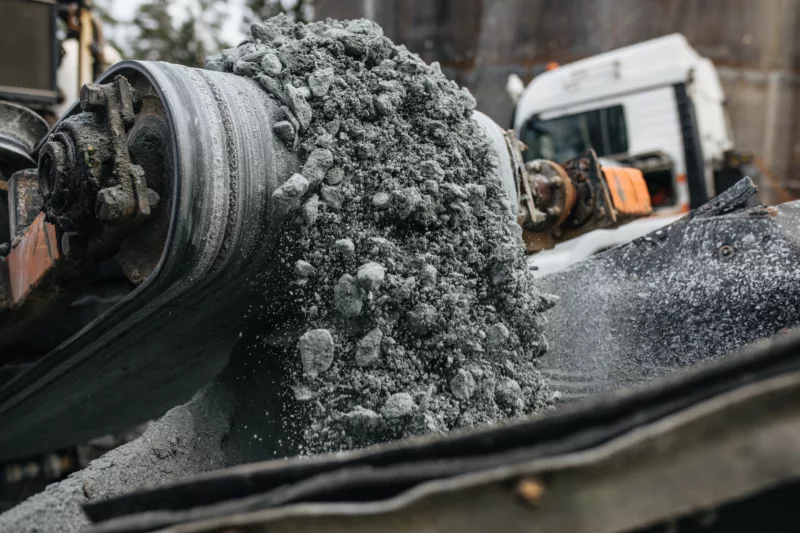 Stream of soapstone in a conveyor belt.